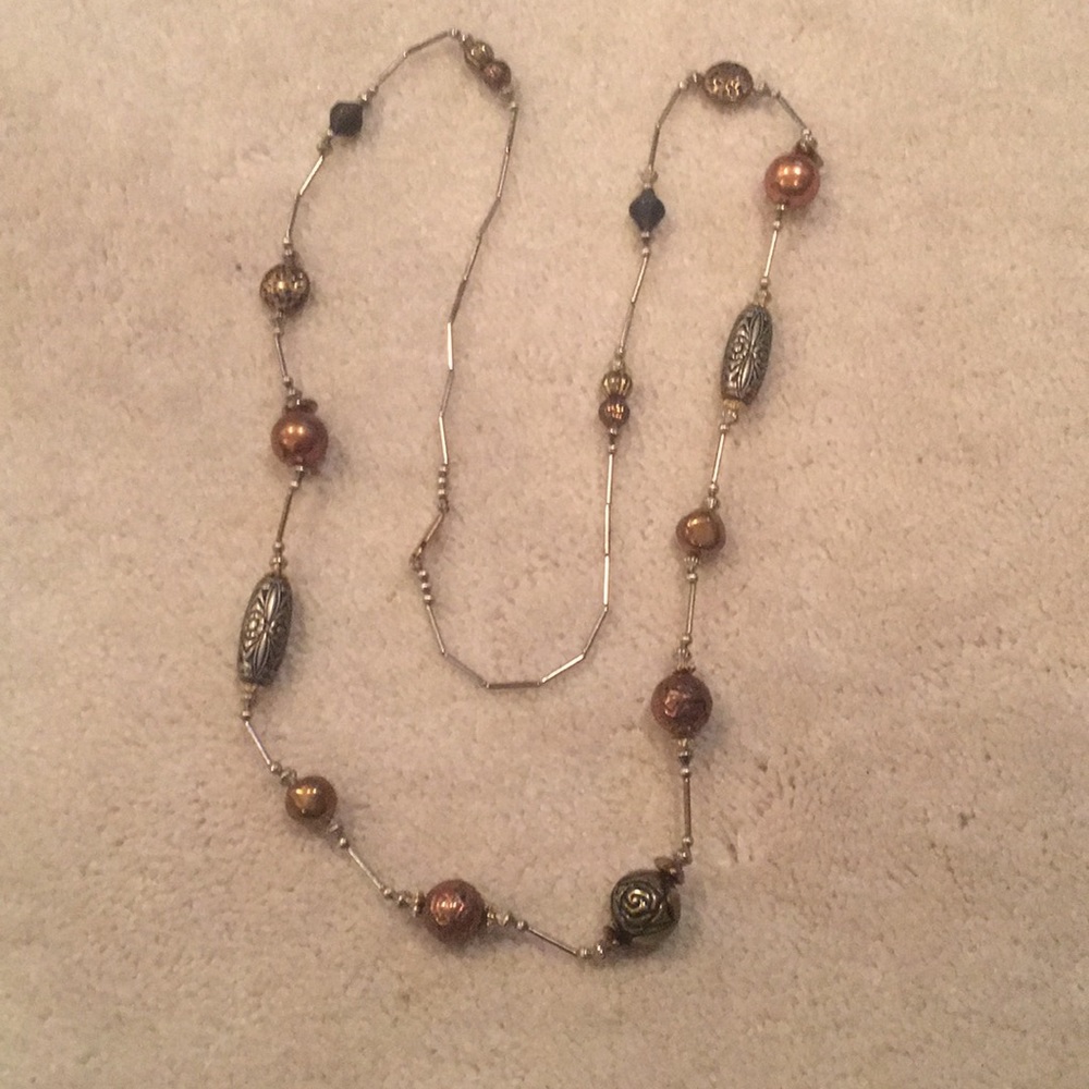 Necklace made from bronze. copper and long beads.