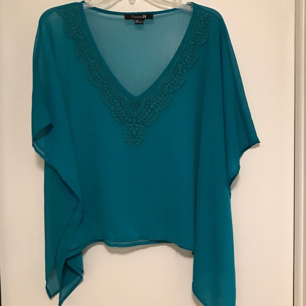 Flowy turquoise top with lace detail v-neck