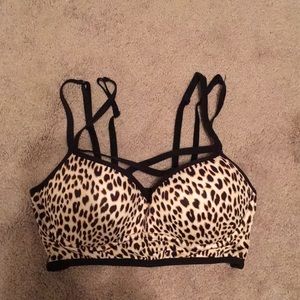Cross-front push up sports bra