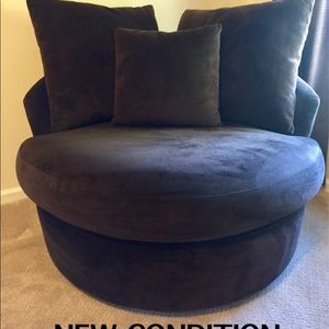 Chocolate color swiveling chair