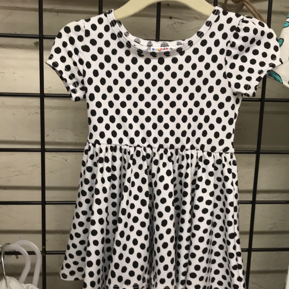 White with black polka dots, cap sleeve dress.