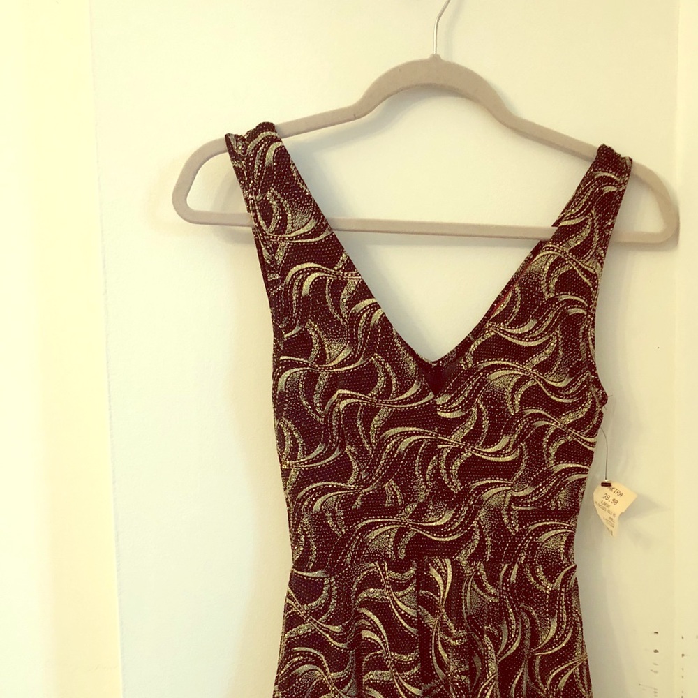 Akira gold and black romper