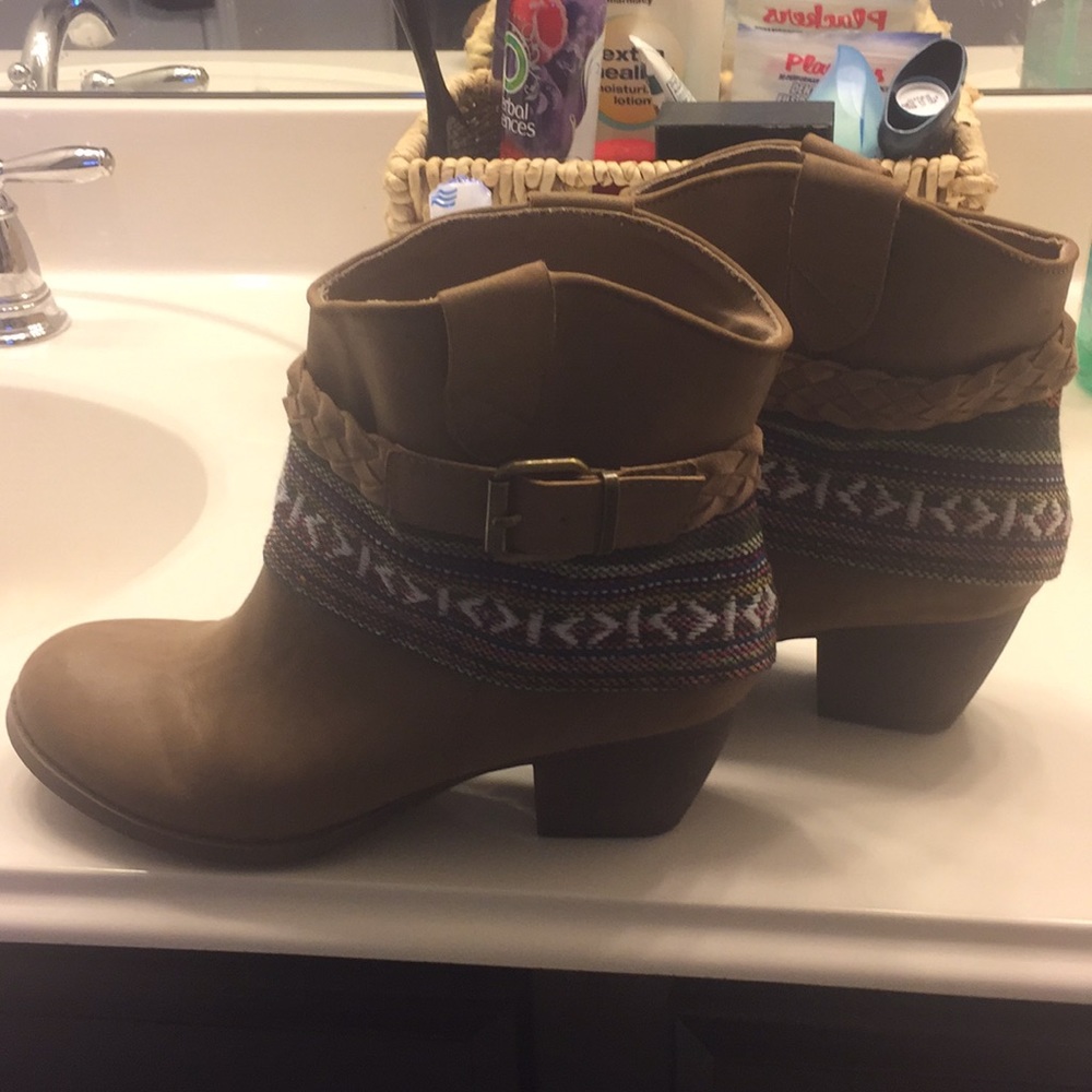 Brown booties with patterned detail