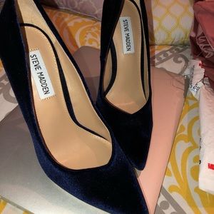 Navy blue suede pumps