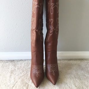 Tall brown leather high heel boots