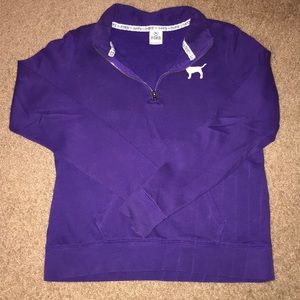 Pink half zip sweatshirt.