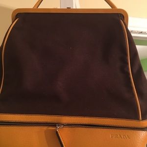 Authentic Prada Canvas and Leather purse.