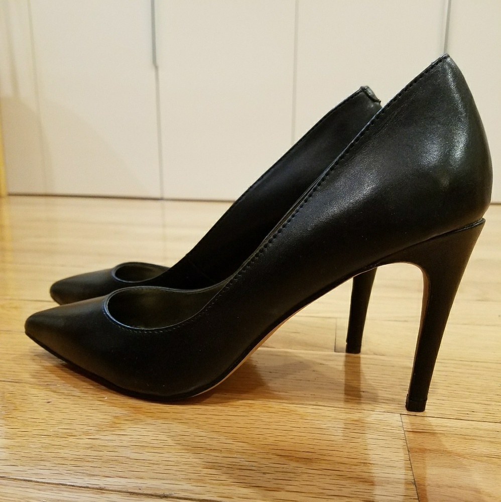 Black leather pumps