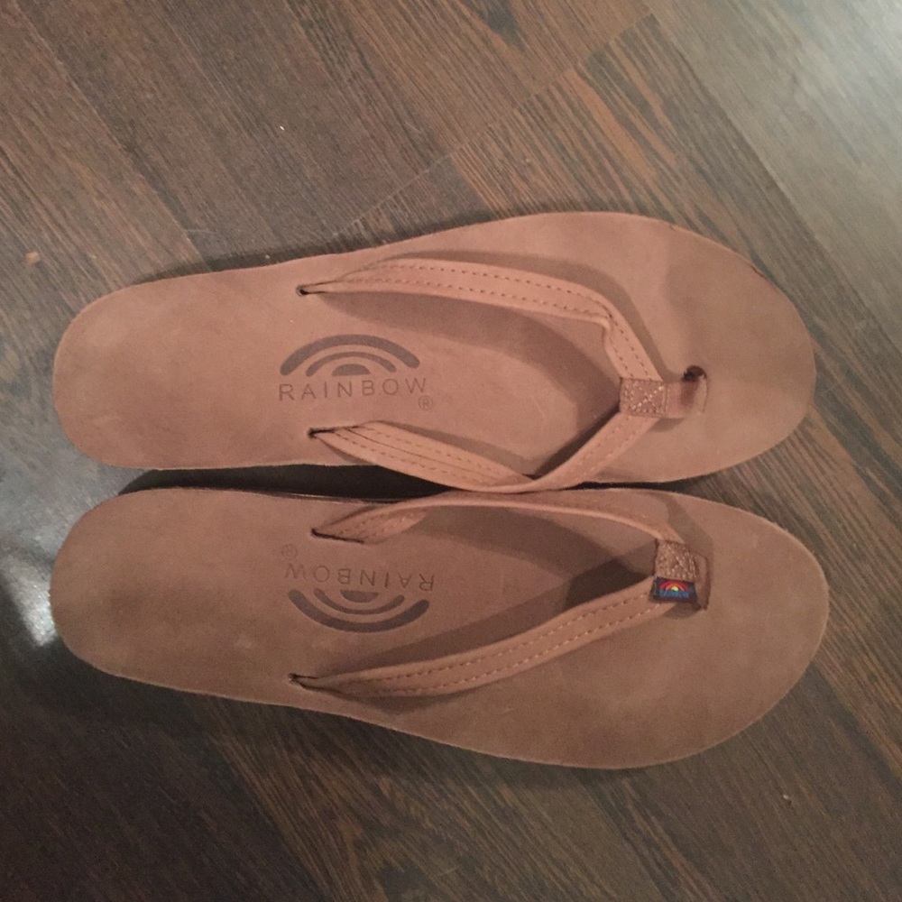 Rainbow flip flops. Dark brown, skinny strap.