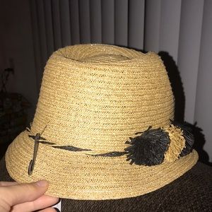 Straw fedora hat with tassel embellishment