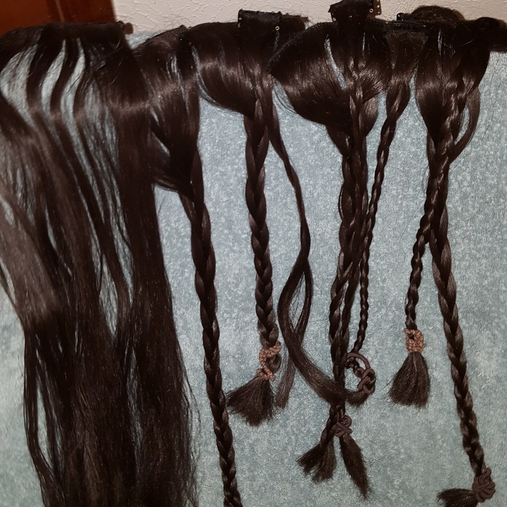 Very dark brown/black clip in extension set