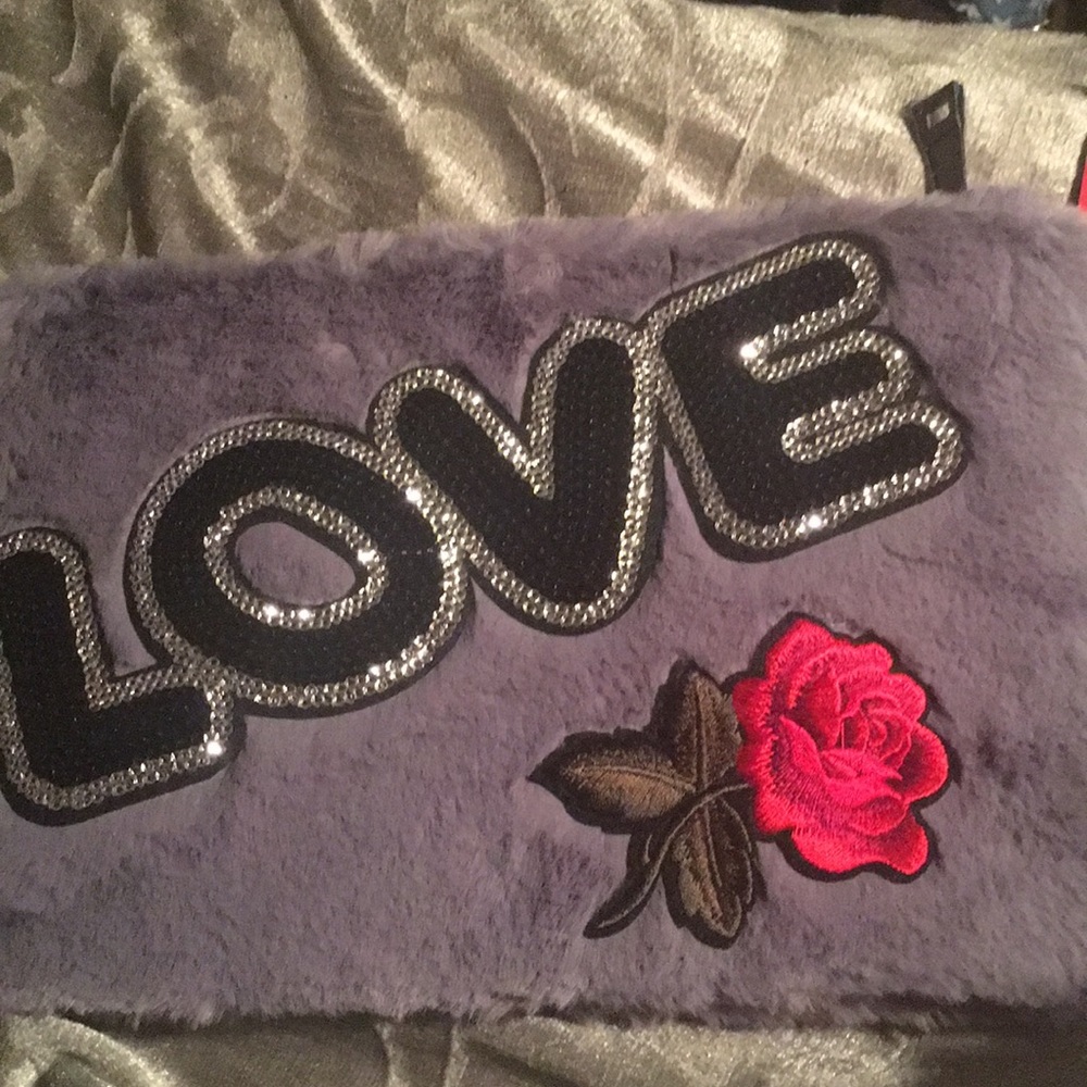 Furry clutch that goes with any outfit!!