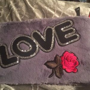 Furry clutch that goes with any outfit!!