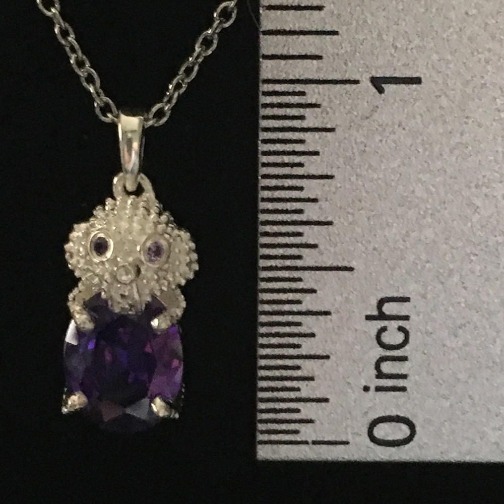 Simulated purple diamond elephant pendant