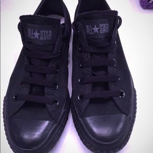 Black all start converse sneakers