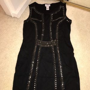 Black body con dress with studded details!