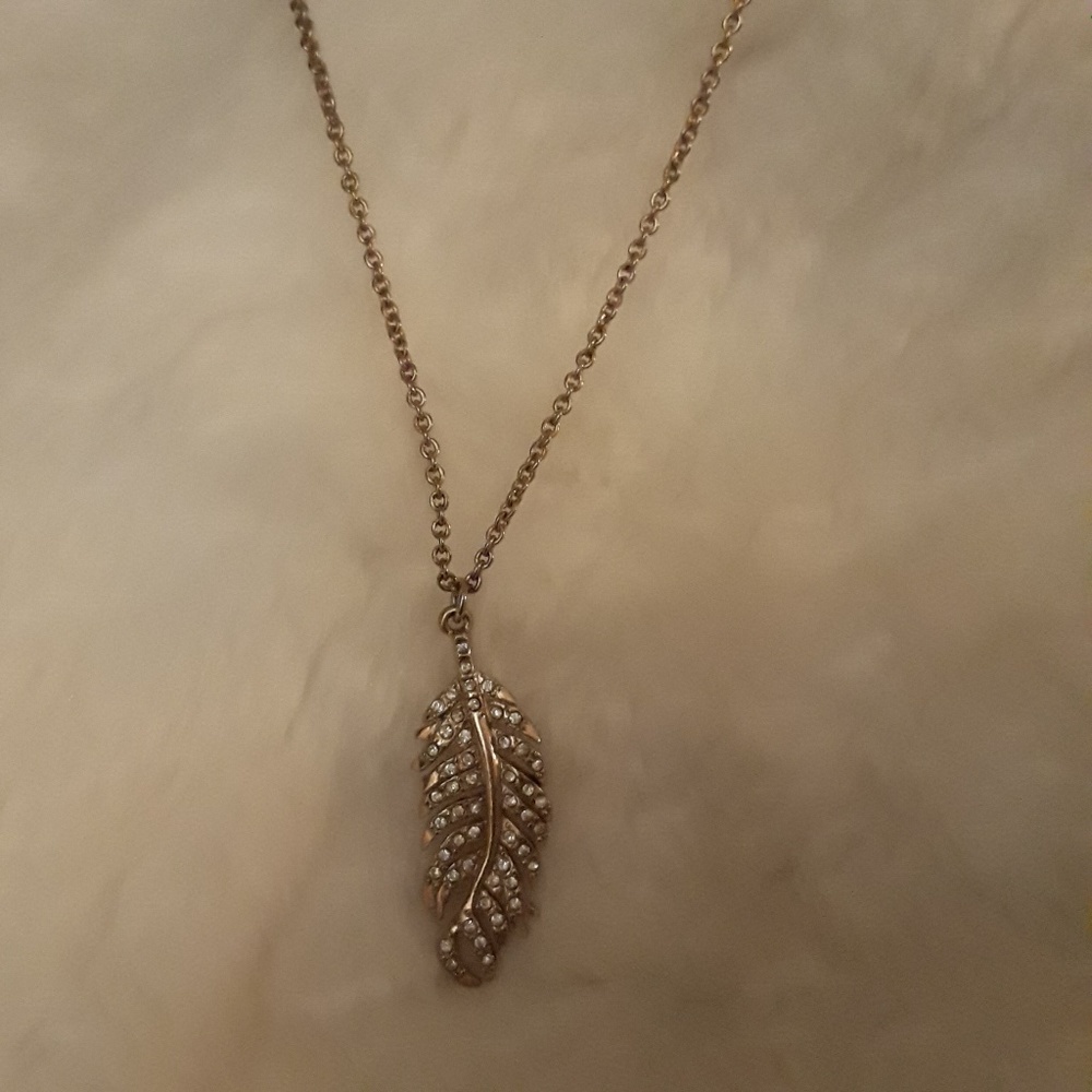 Gold feather diamond necklace