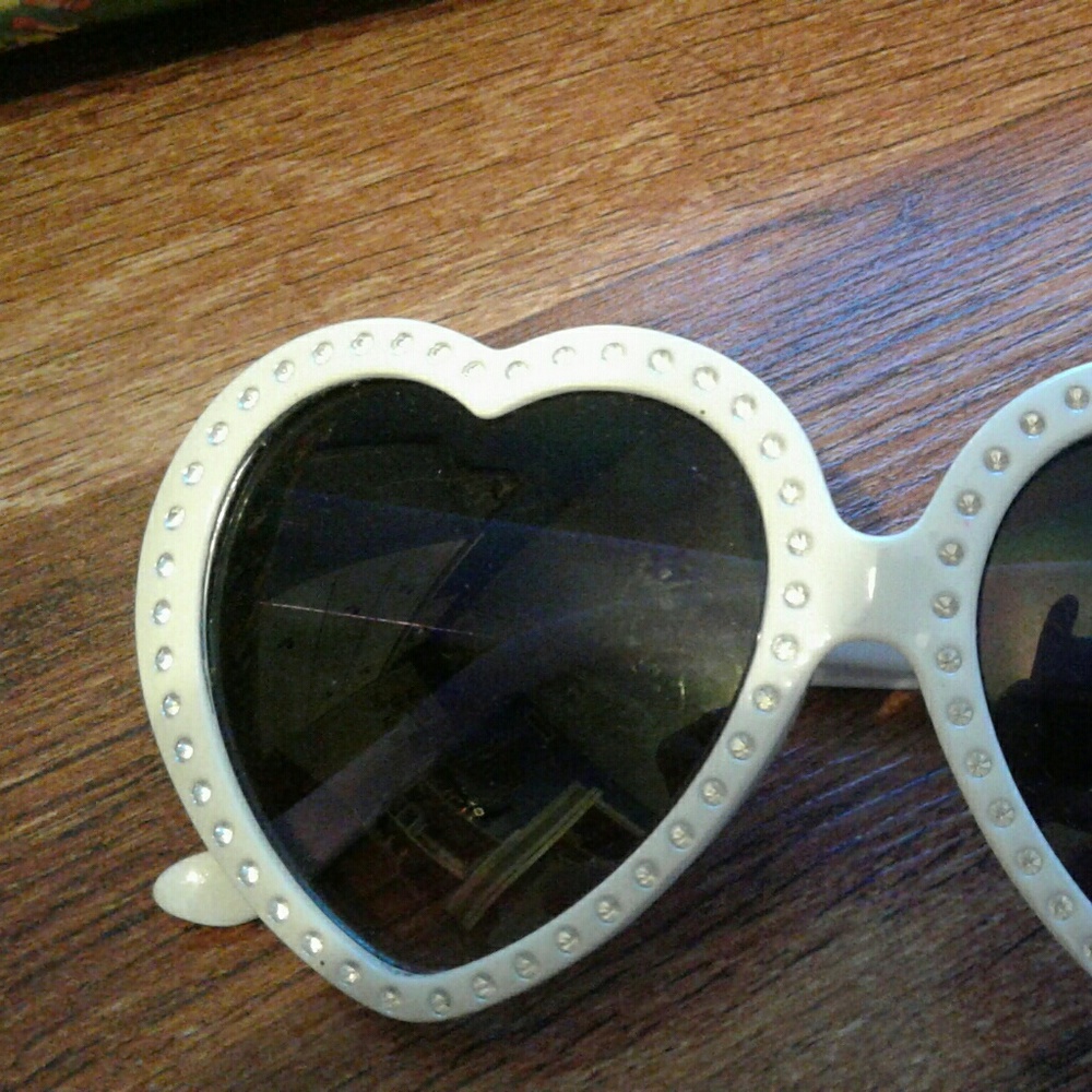 White framed heart shaped glasses