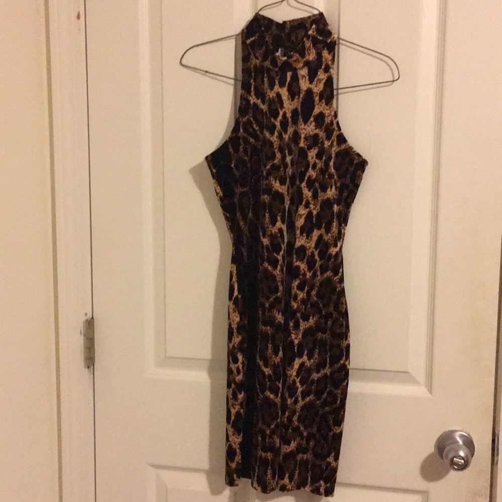 Sleeveless turtleneck leopard print dress