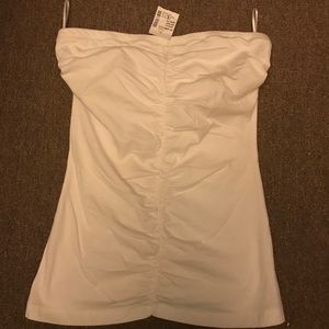 Top no shoulder. Fit Small. Stated size L