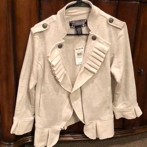Light colored zippered jacket