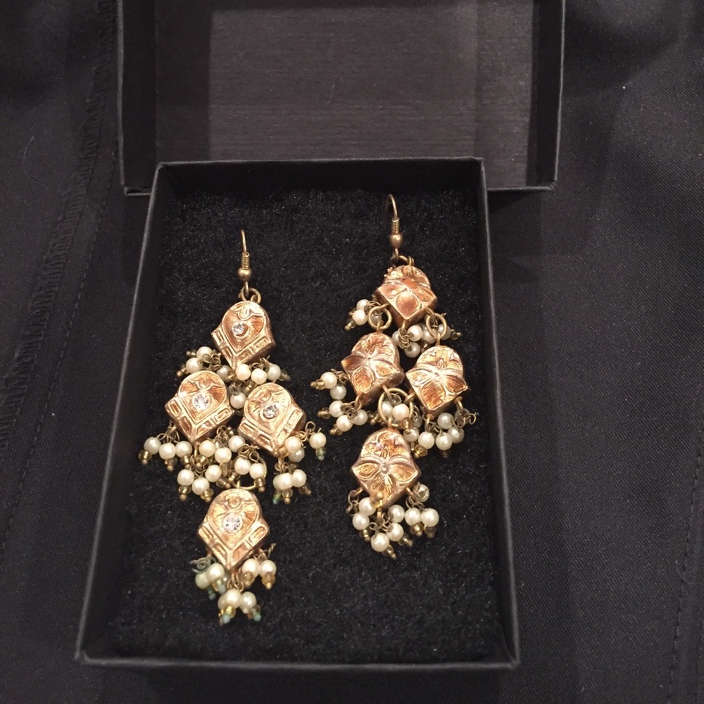 Dressy & Sexy Gold Earrings with stone accents.