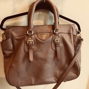 Prada leather tote/satchel with crossbody strap.
