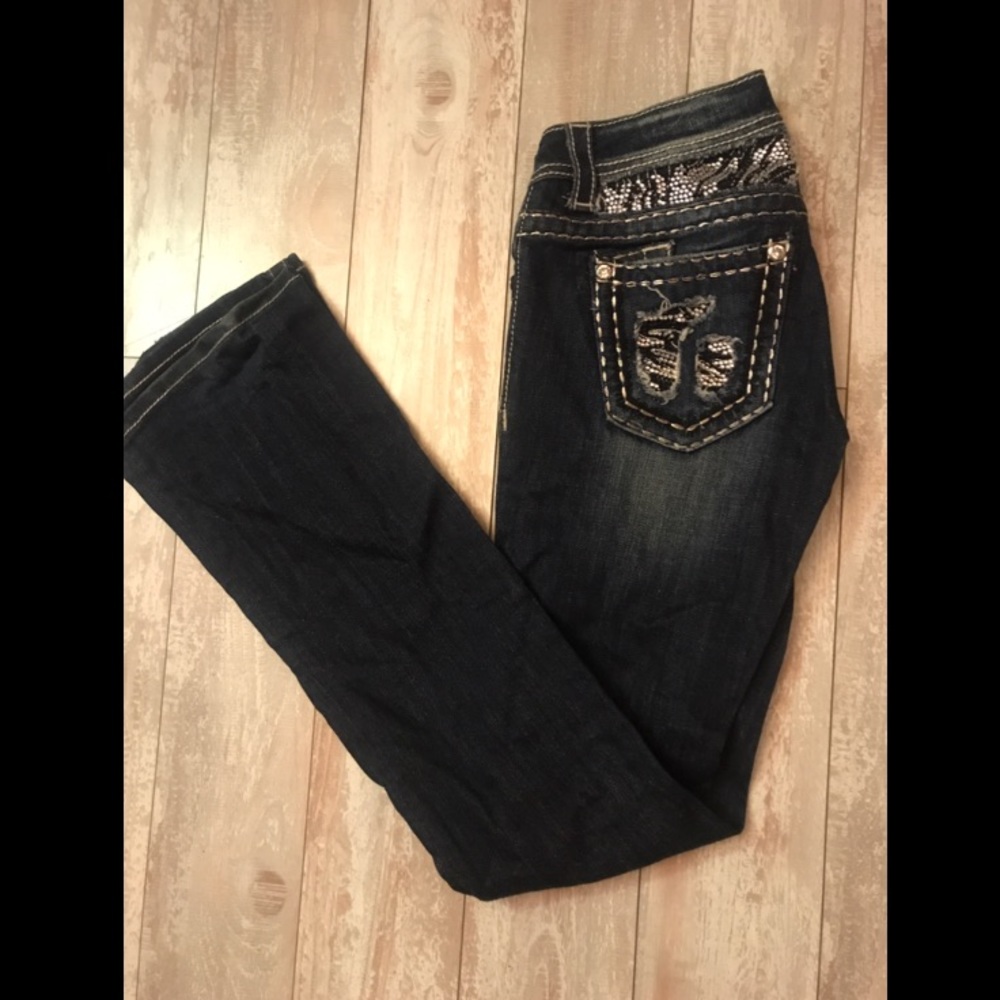 Boot leg dark denim jeans.