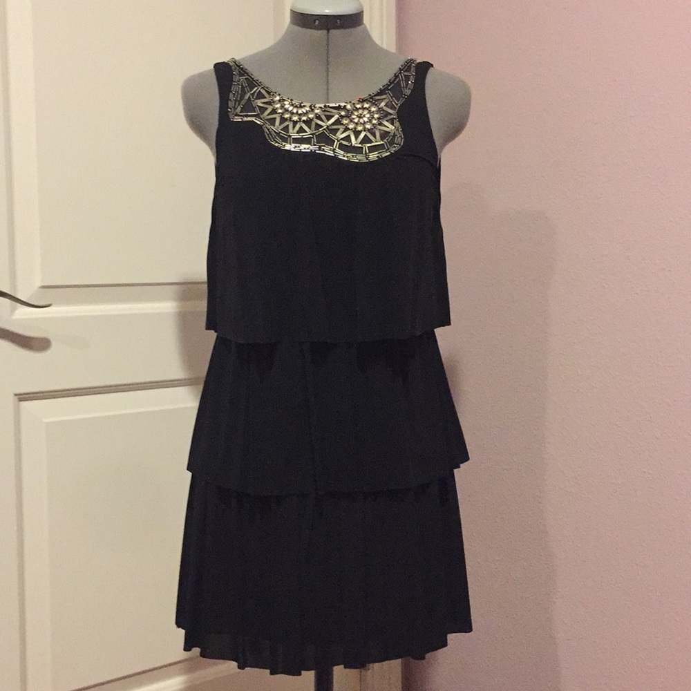 Little black dress with detailed neckline