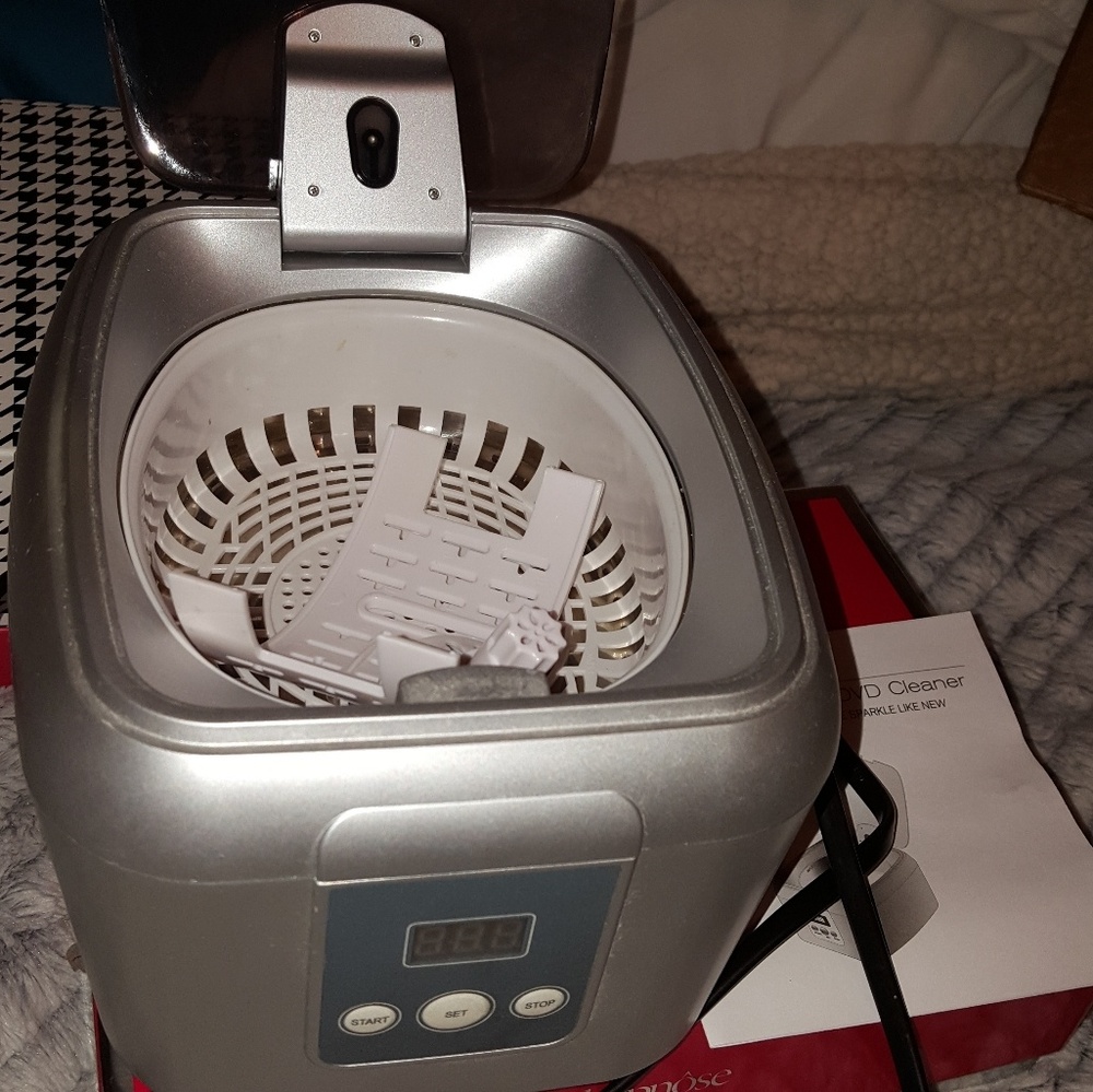 Brookstone ultrasonic jewelry, glasses, dvd cleane