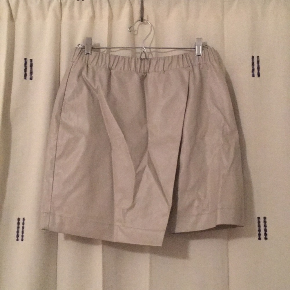 Off-white faux-leather asymmetrical miniskirt