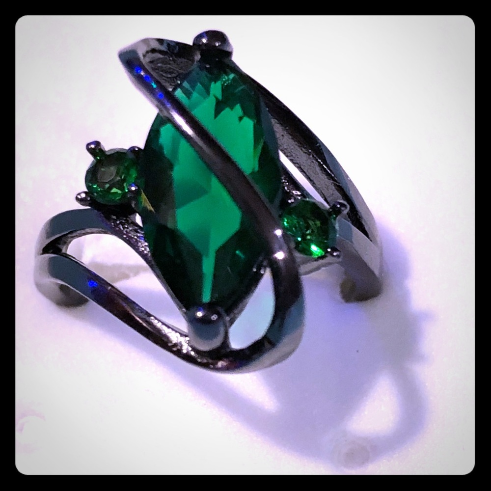 Emerald green colored marquise costume ring