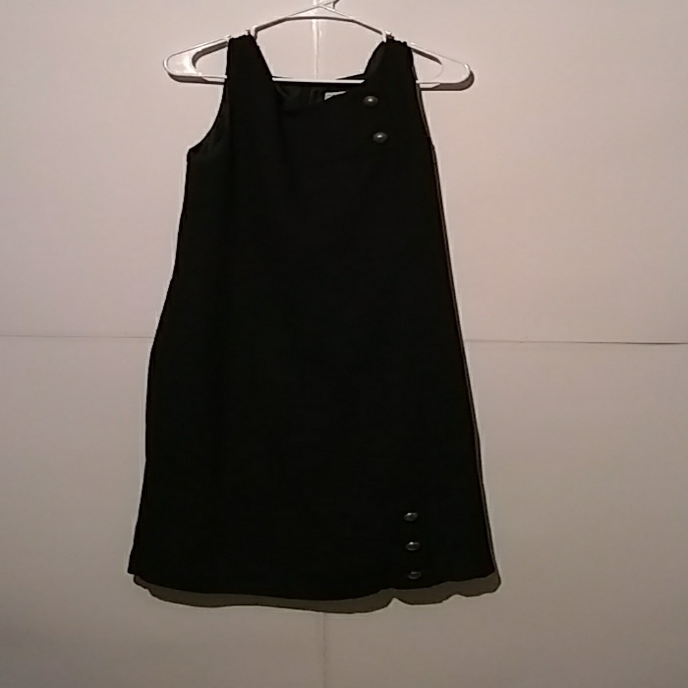 Karen Stevens black dress with brass buttons