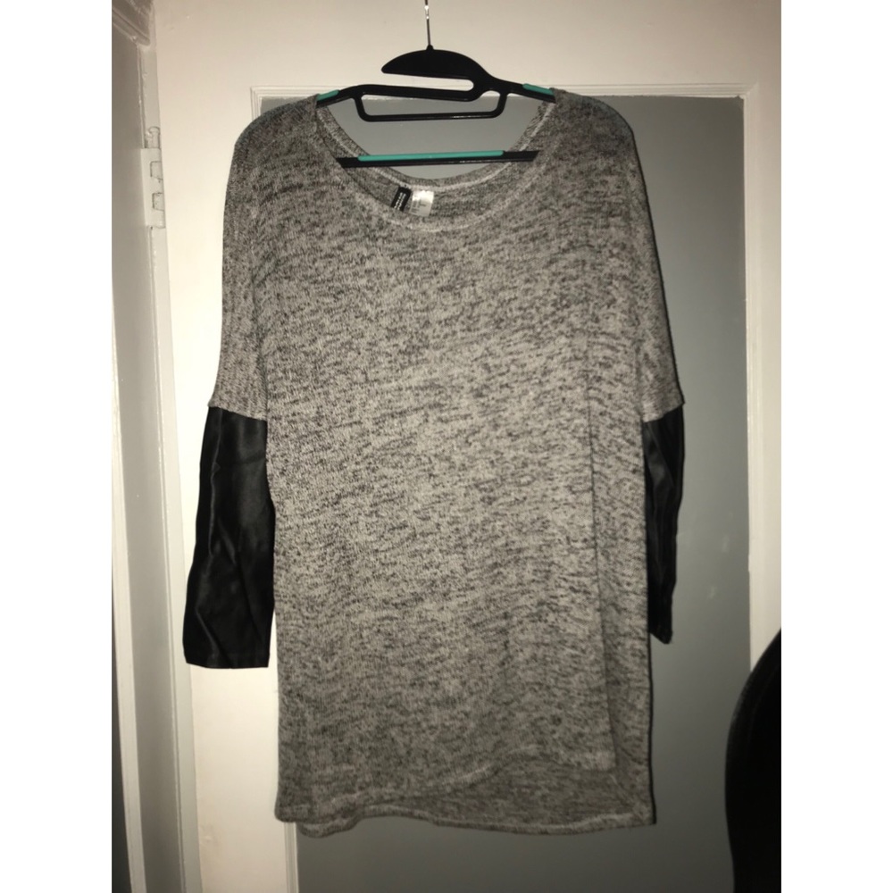 Grey tunic with leather sleeves
