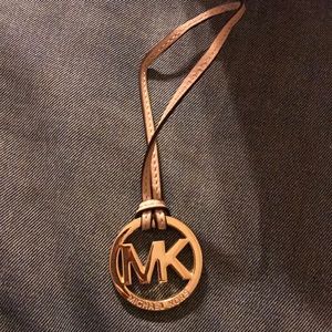 Michael Kors emblem