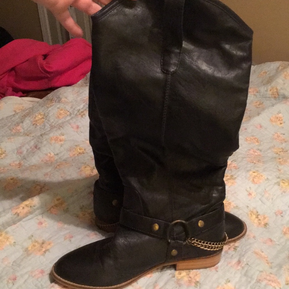 Tall black leather boots