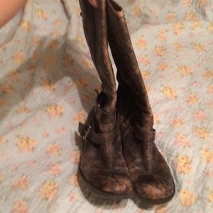 Buttery soft leather distressed boots.