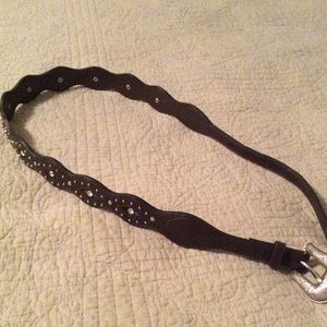 Brown leather belt with silver accents