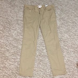 Khaki skinny jeans.