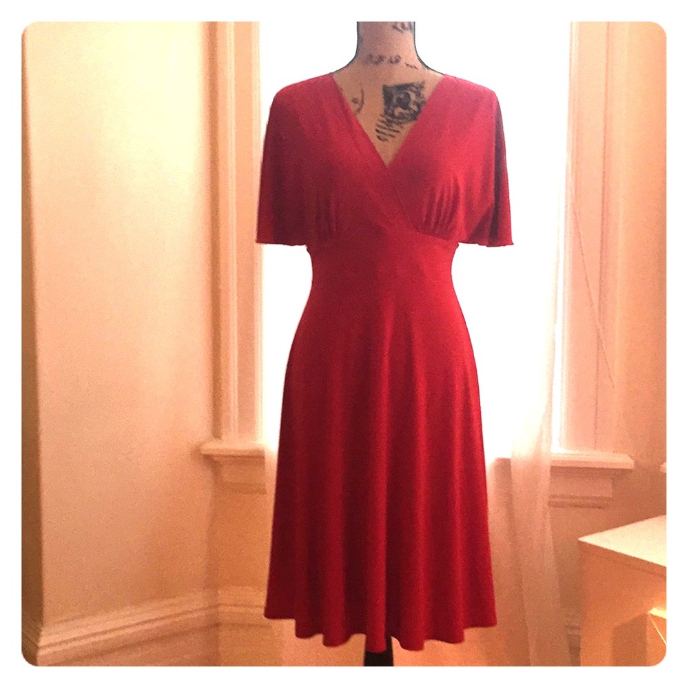 Red dress with flattering details.