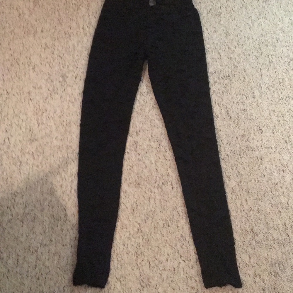 Black leggings with cuts/rips