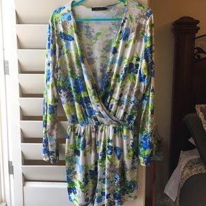 Honey Punch long sleeve floral romper!