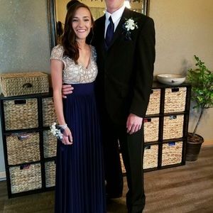 Long navy blue sequin top prom dress.