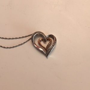 Diamond titled double heart pendant