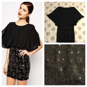Sold- Amazing Black Flora dress with sequin skirt!
