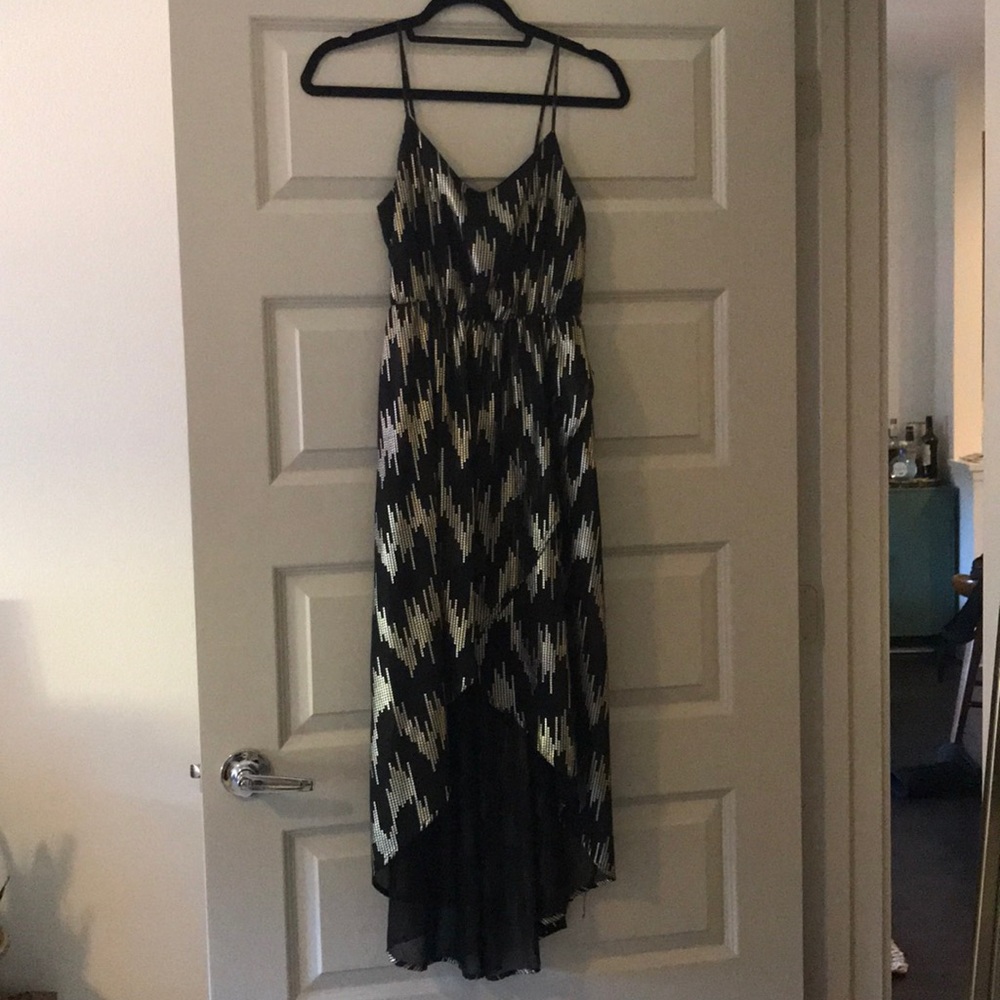 Small black with gold embellishments small dress