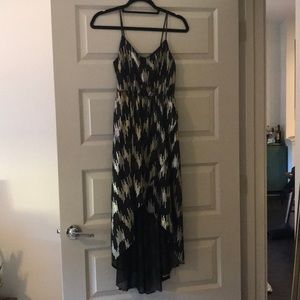 Small black with gold embellishments small dress