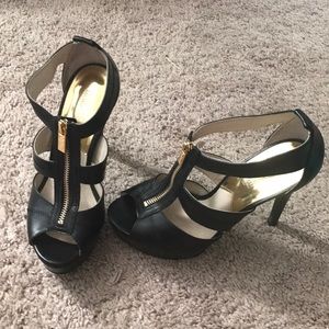 Michael Kors Black high heels with gold zipper