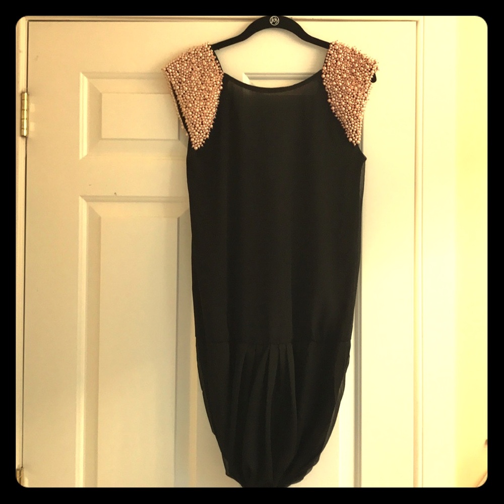 Black low back dress with beaded sleeves