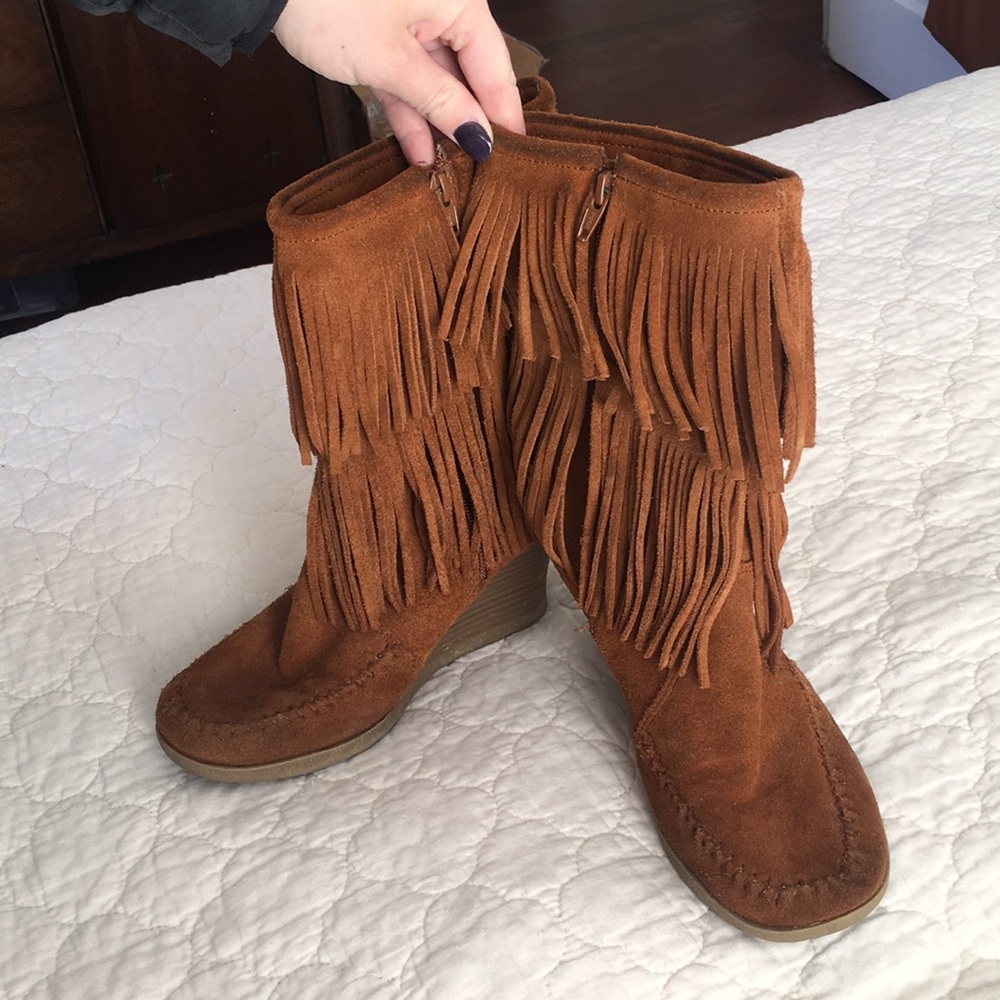 Minnetonka leather fringe wedge boots